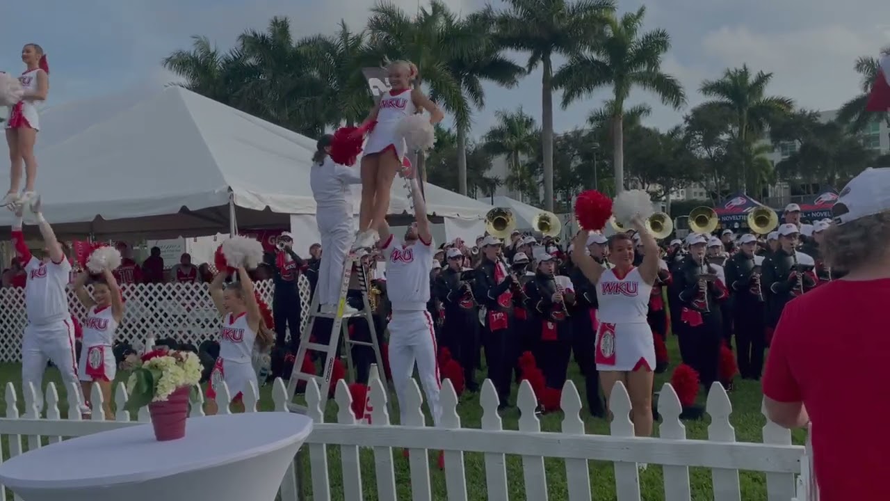 Western Kentucky University Marching Band plays Go Toppers and their fight song Stand Up and Cheer