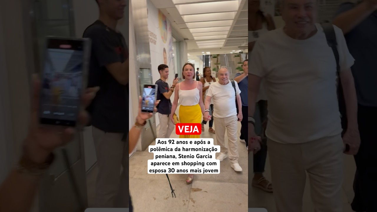 Ap&oacute;s pol&ecirc;mica da harmoniza&ccedil;&atilde;o peniana, Stenio Garcia aparece com esposa 30 anos mais jovem.