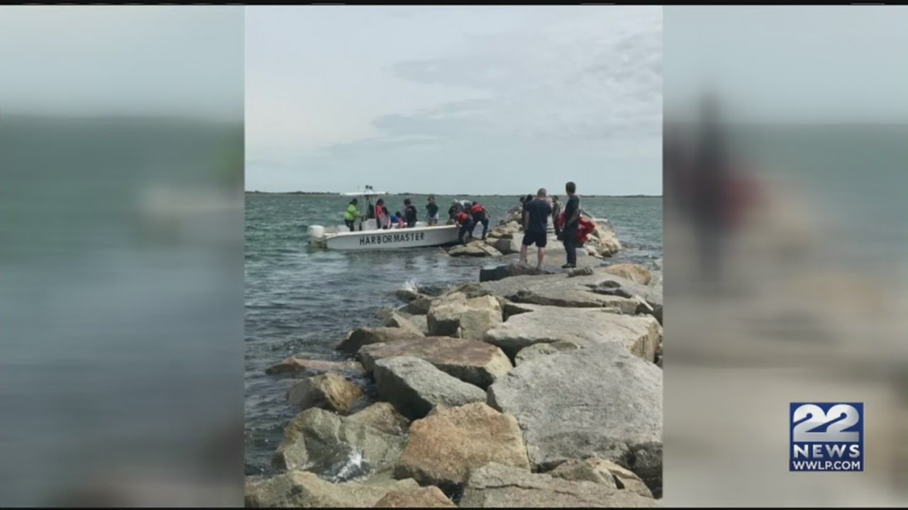44 people rescued after high tide traps them on breakwall