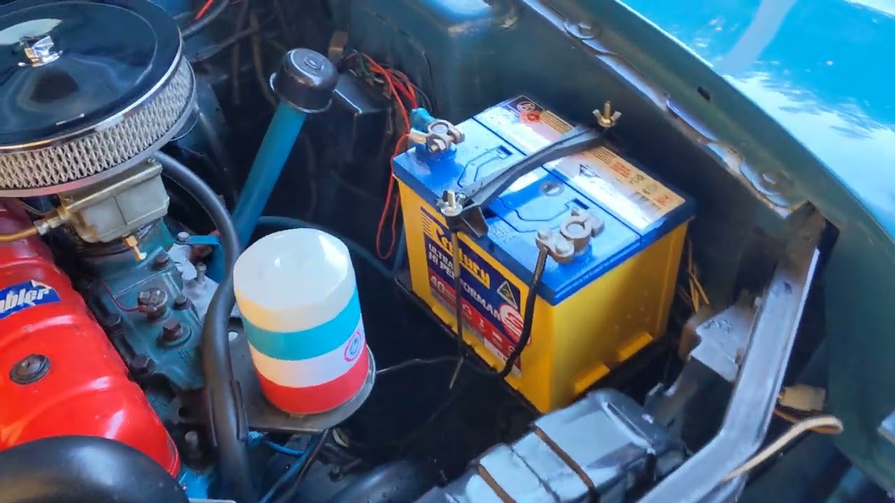 AMC 196 c.i. six cylinder motor idling.