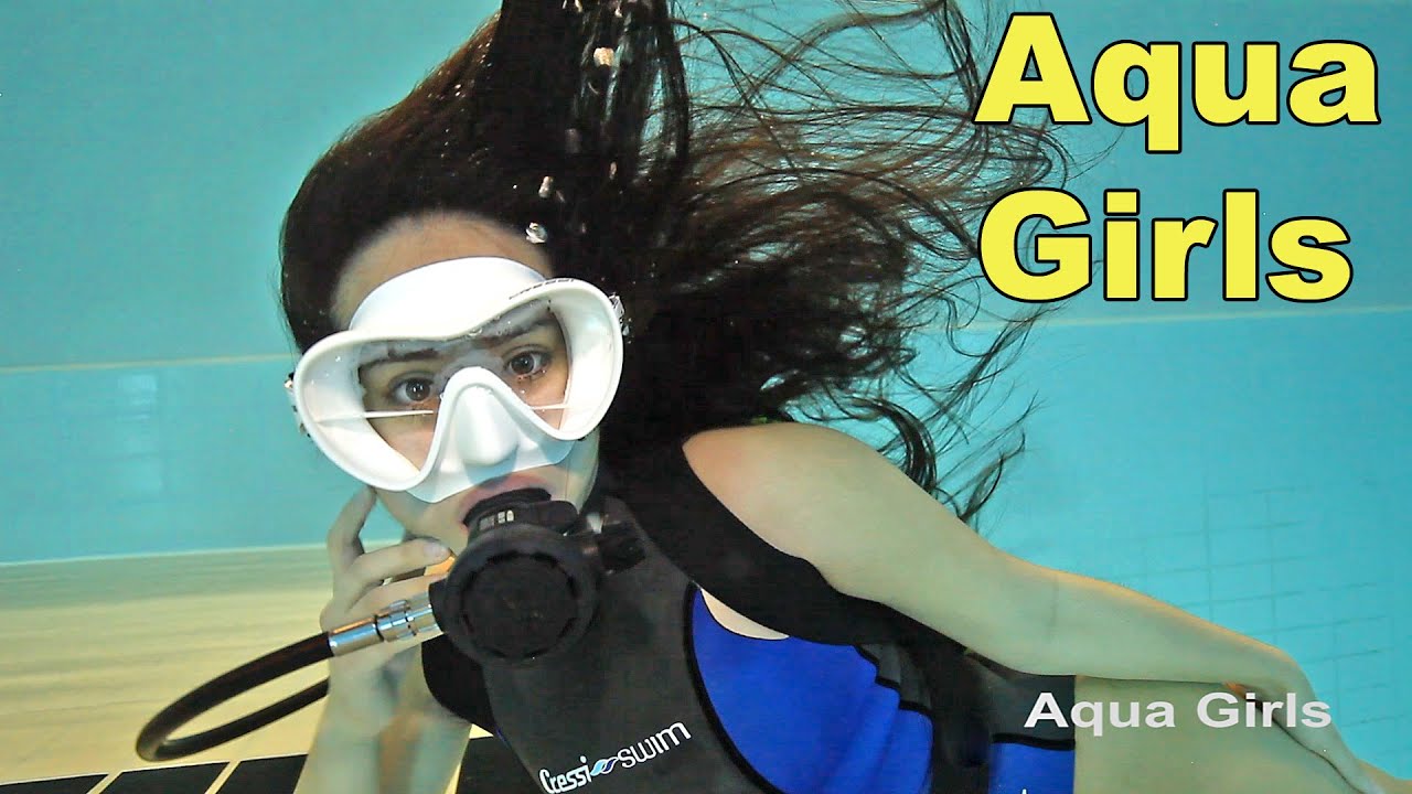 Beautiful Girl Scuba Diving open hair Underwater