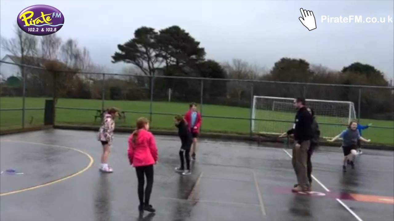Neil and Tina try a skipping challenge at Crowan School