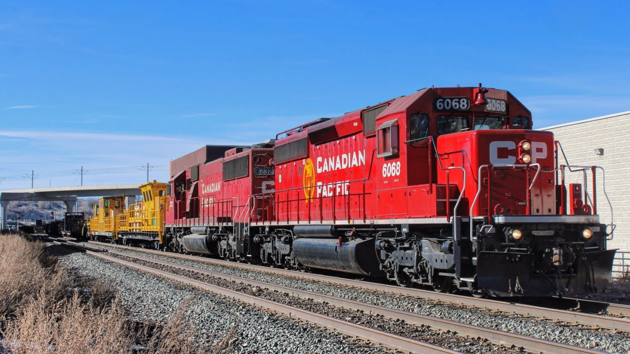 RARE! CP 6068 SD40-2 leading CP work train Eastbound arriving Calgary, AB on the Laggan subdivision.