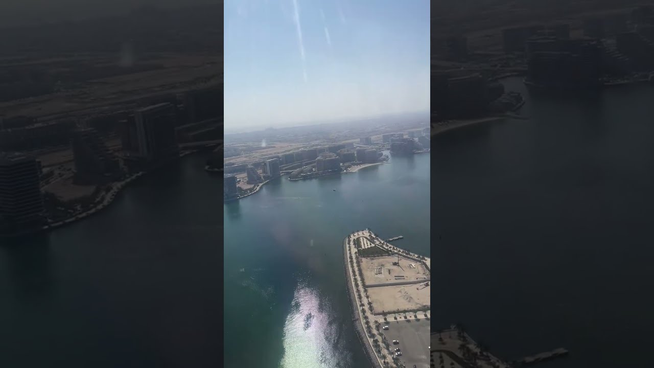 روعة المنظر   لمدينة أبوظبي من الجو و الهبوط التدريجي في مطار أبوظبي