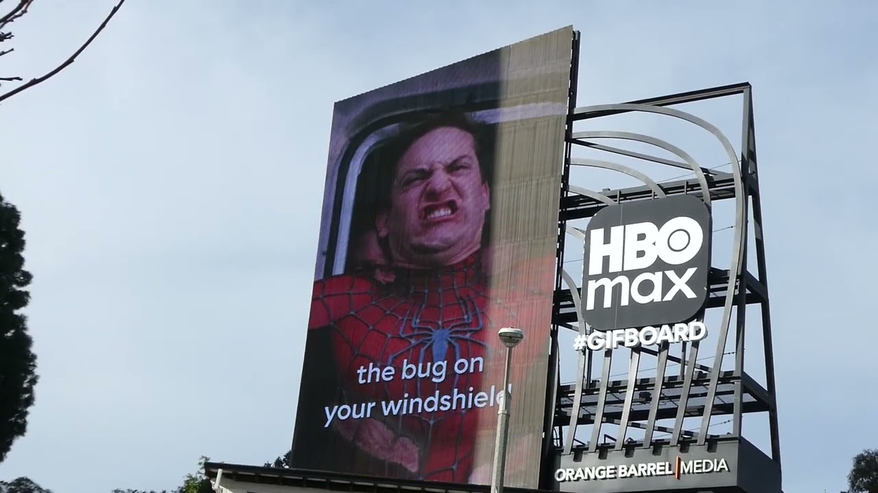 Waymo Car Tobey Maguire & The Singers Billboard Sunset Blvd Los Angeles California March 13, 2026