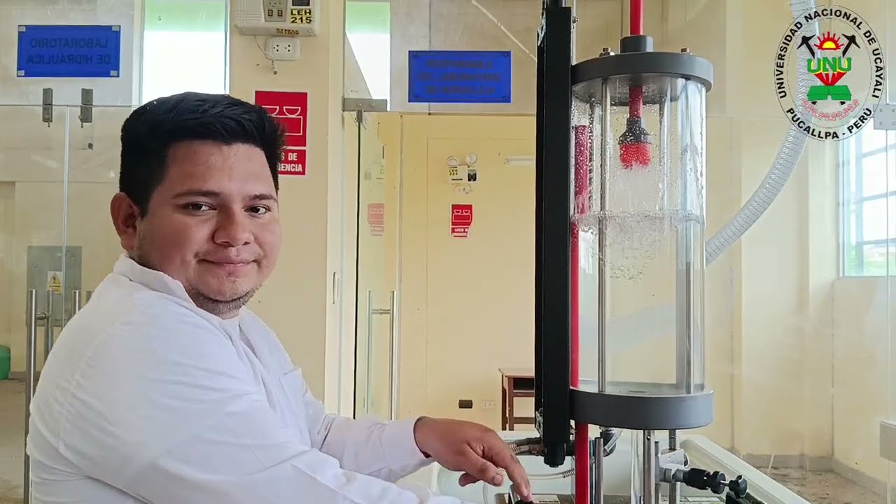 ENSAYO DE DESCARGA VERTICAL POR ORIFICIOS CON EL EQUIPO HM 150.12