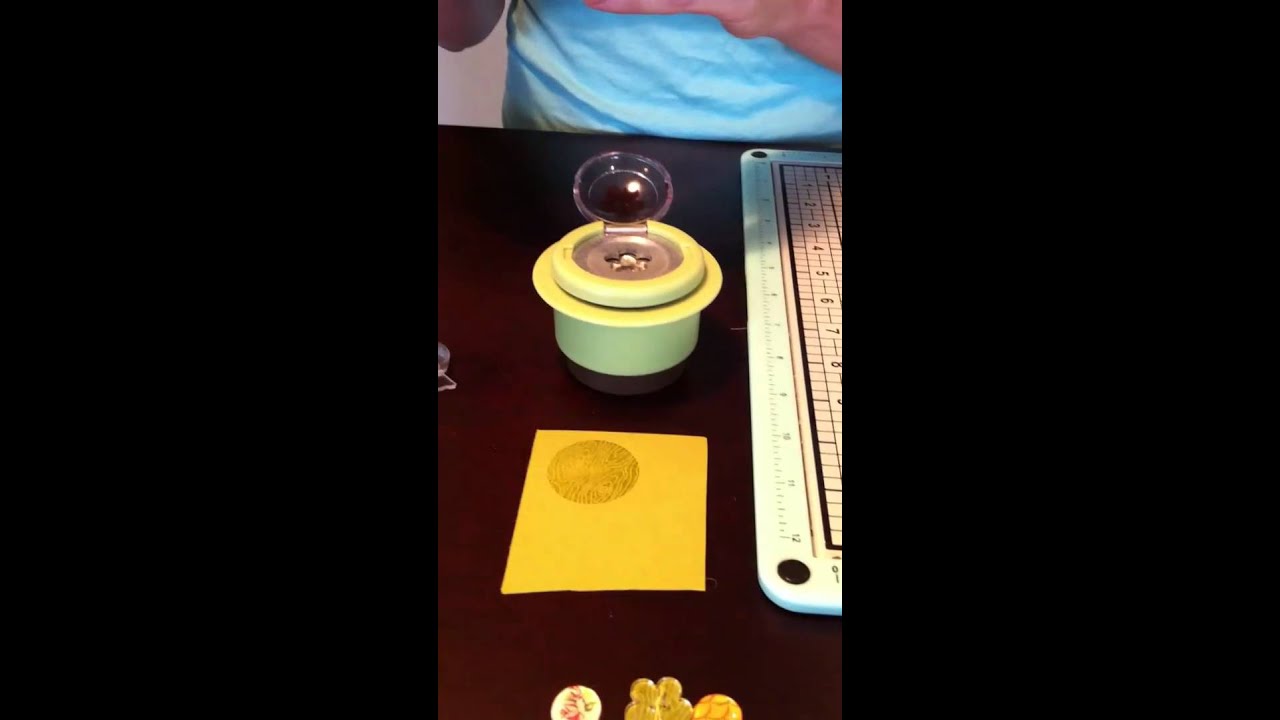 April Foster demos the Epiphany Crafts button maker