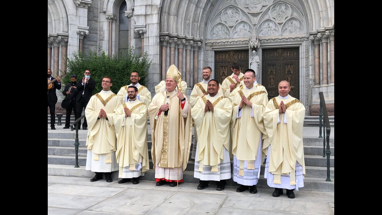 The scene outside the cathedral following the ordination of 10 priests, 6.21.2020