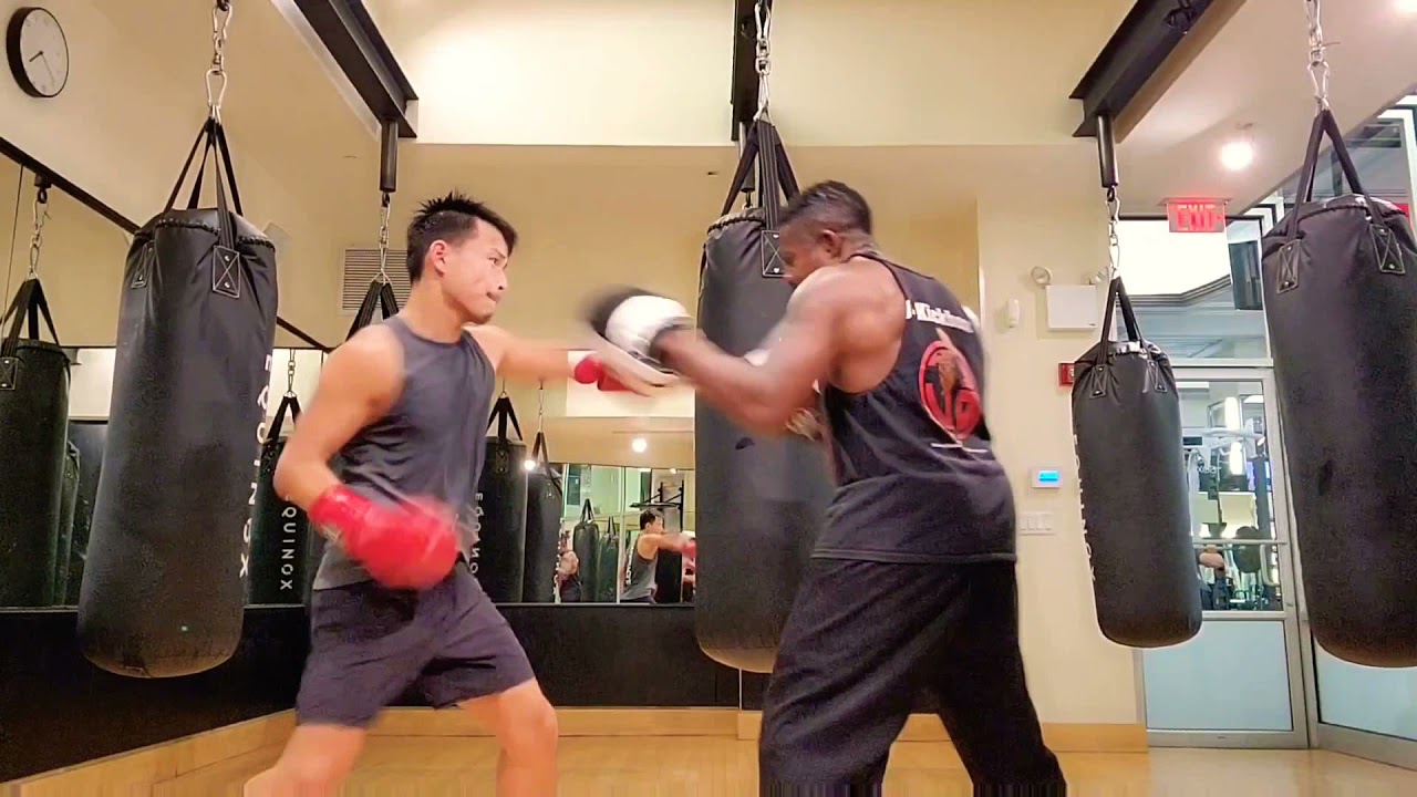 Boxing / Kickboxing mitt work (Equinox fitness).