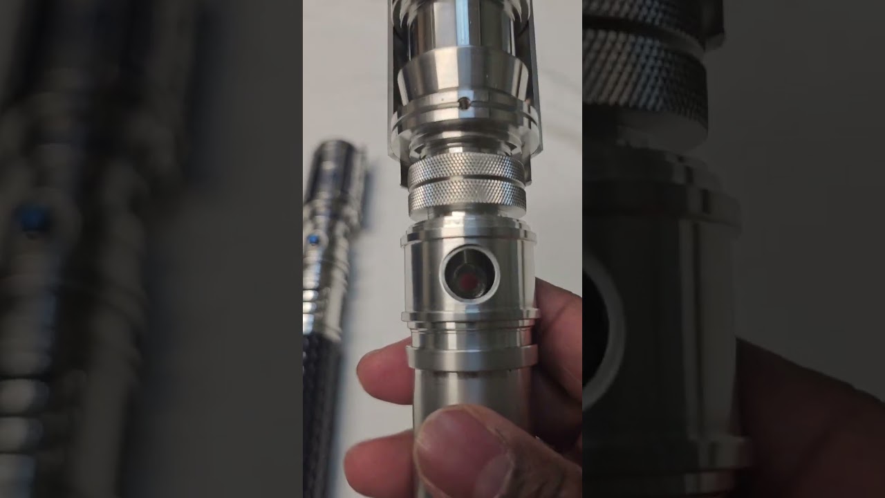 Comparison of the KR Flagship and the AFAY Props Zero 5 hilts.