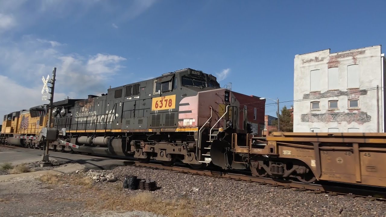 Southern Pacific DPU and CNW caboose in Belle Plaine, Ia. 5 total trains, multiple drone views!