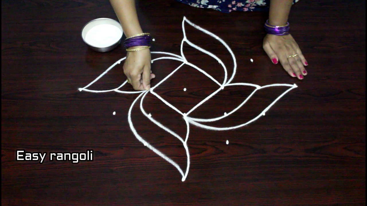 creative rangoli designs with 7x1 dots , simple kolam designs with dots , muggulu designs