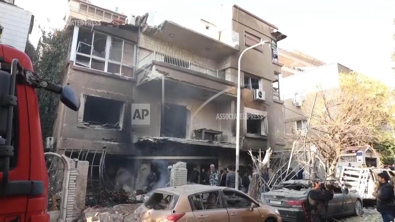 Emergency services at scene after 2 Israeli airstrikes hit Syria's capital and a suburb