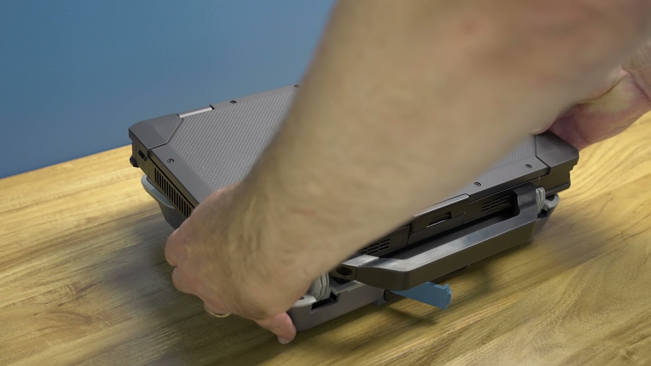How to Dock and Release the Dell Latitude Rugged Laptop Docking Station