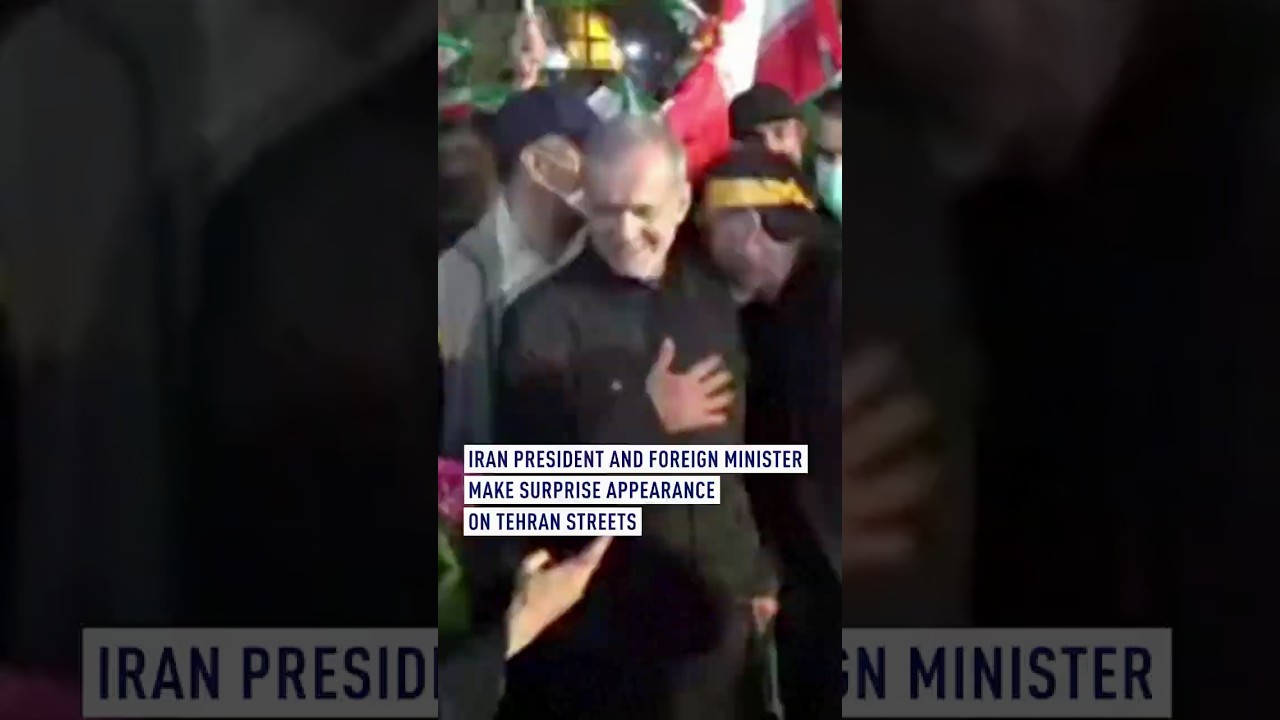 Iran president, foreign minister make surprise appearance on Tehran streets