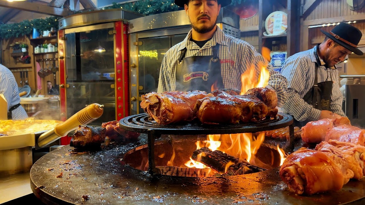 Christmas Market in Paris, France. The best French grilled sausages at the Marché Gourmand!