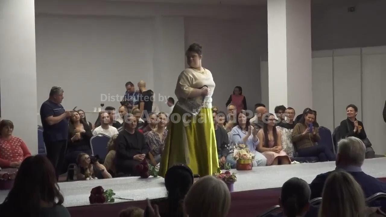 Dozens of models with Downs syndrome take to the catwalk at Bucharest fashion show