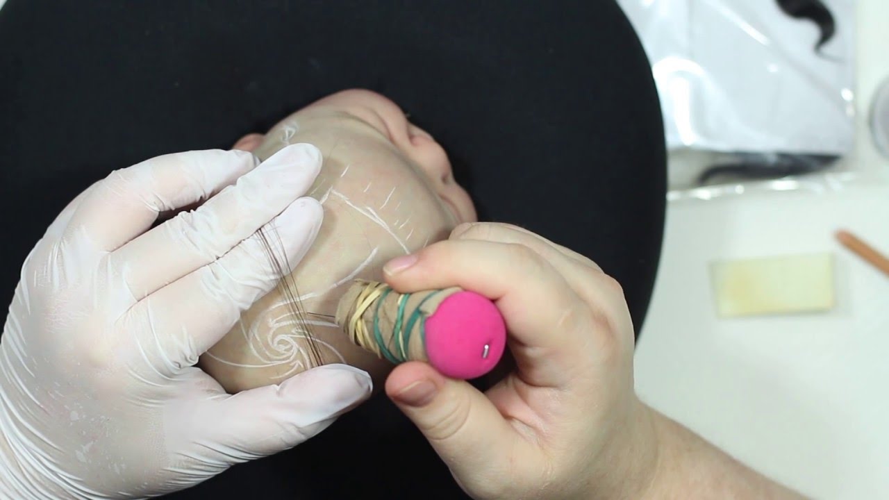 Hair rooting of a vinyl reborn doll