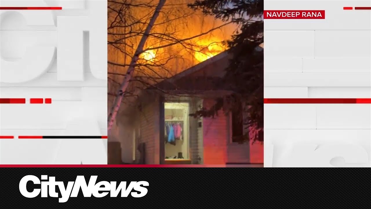 Two-alarm fire damages two homes in NE Calgary