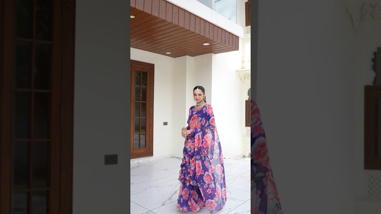 This flowy saree blends vibrant prints. From family functions to festive brunches,it&rsquo;s a total mood.