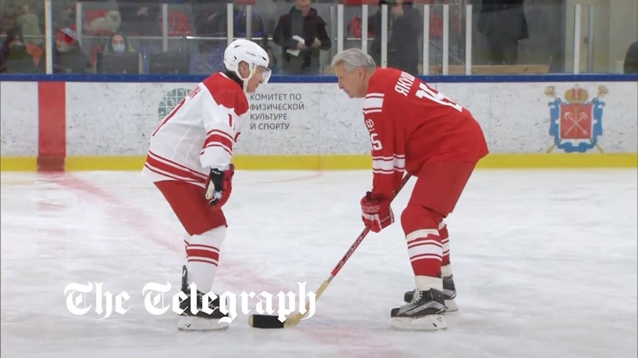 Russian President Putin and Belarusian President Lukashenko play ice hockey on the same team