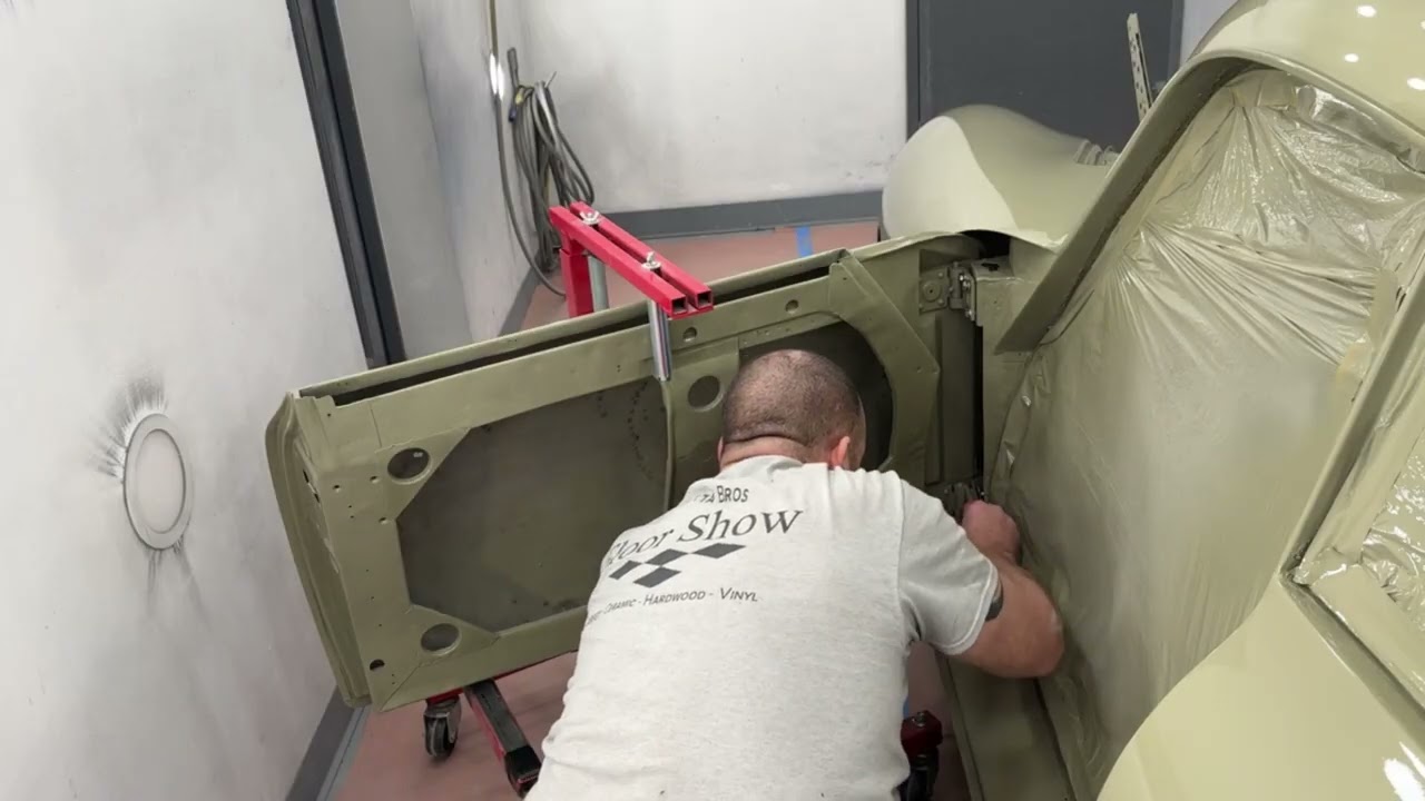 The 56 Porsche body panels are back on the car next step, wetsand and repaint