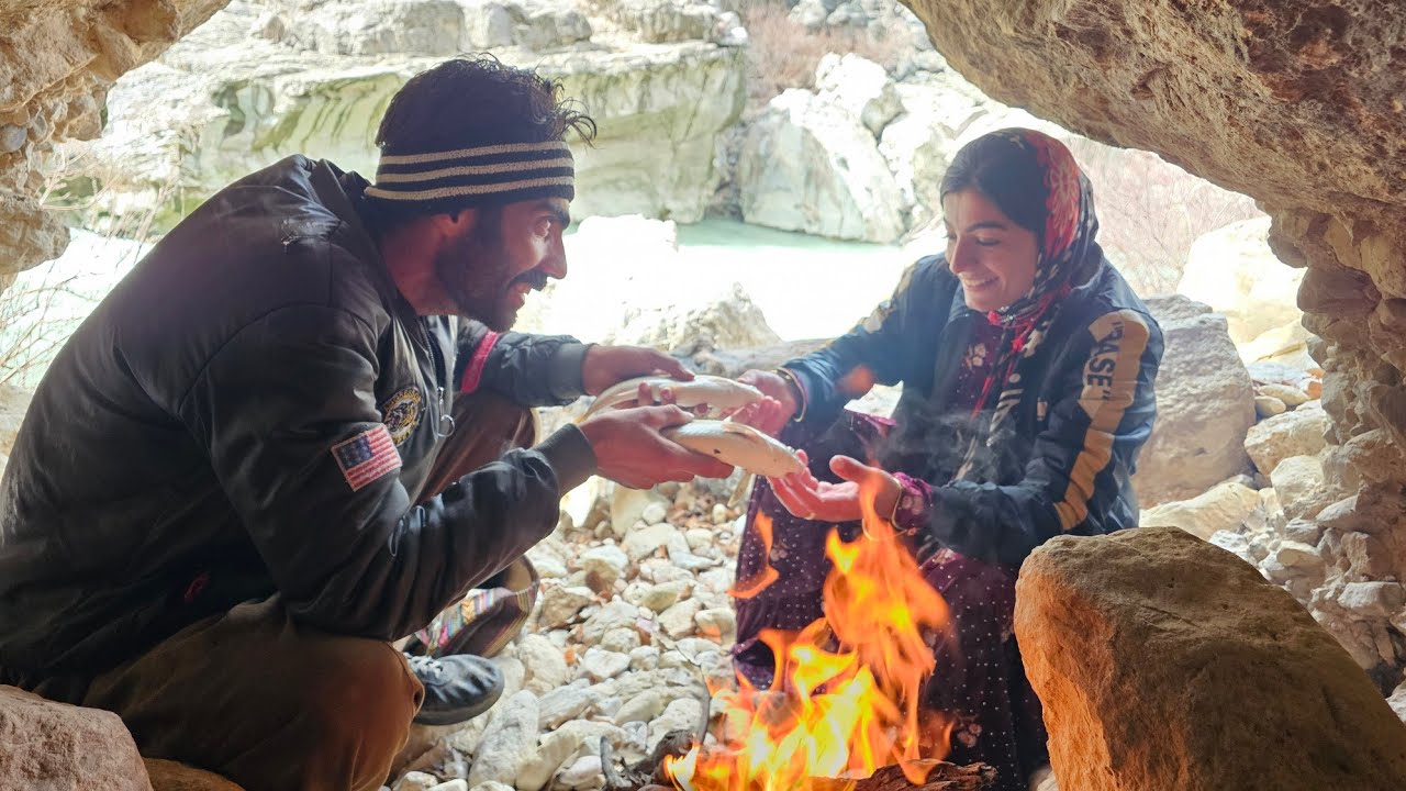 Layla and Shahin are fishing in heavy rain and go under a large rock to save their lives.
