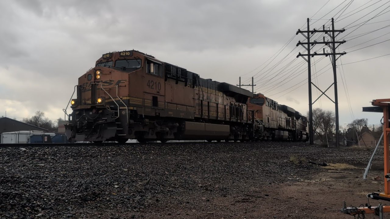 BNSF 4210 leads a NB TGNX empty in the rain