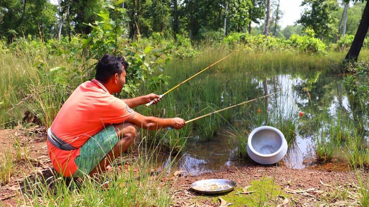 Fishing Video || The skilled fisherman boy is fishing with a hook in the forest canal | Fish hunting