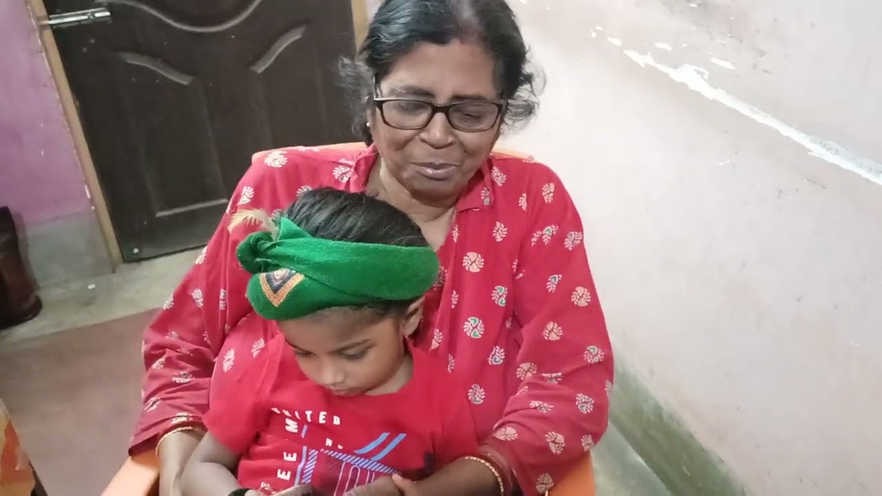 মোবাইলের নেশায় বুঁদ হয়ে থাকা দুই প্রজন্ম।