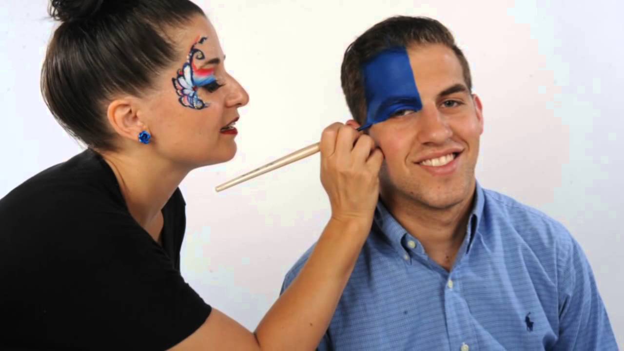 Newsers Jeanette Settembre & Jason Bisnoff Get Patriotic Face Paint