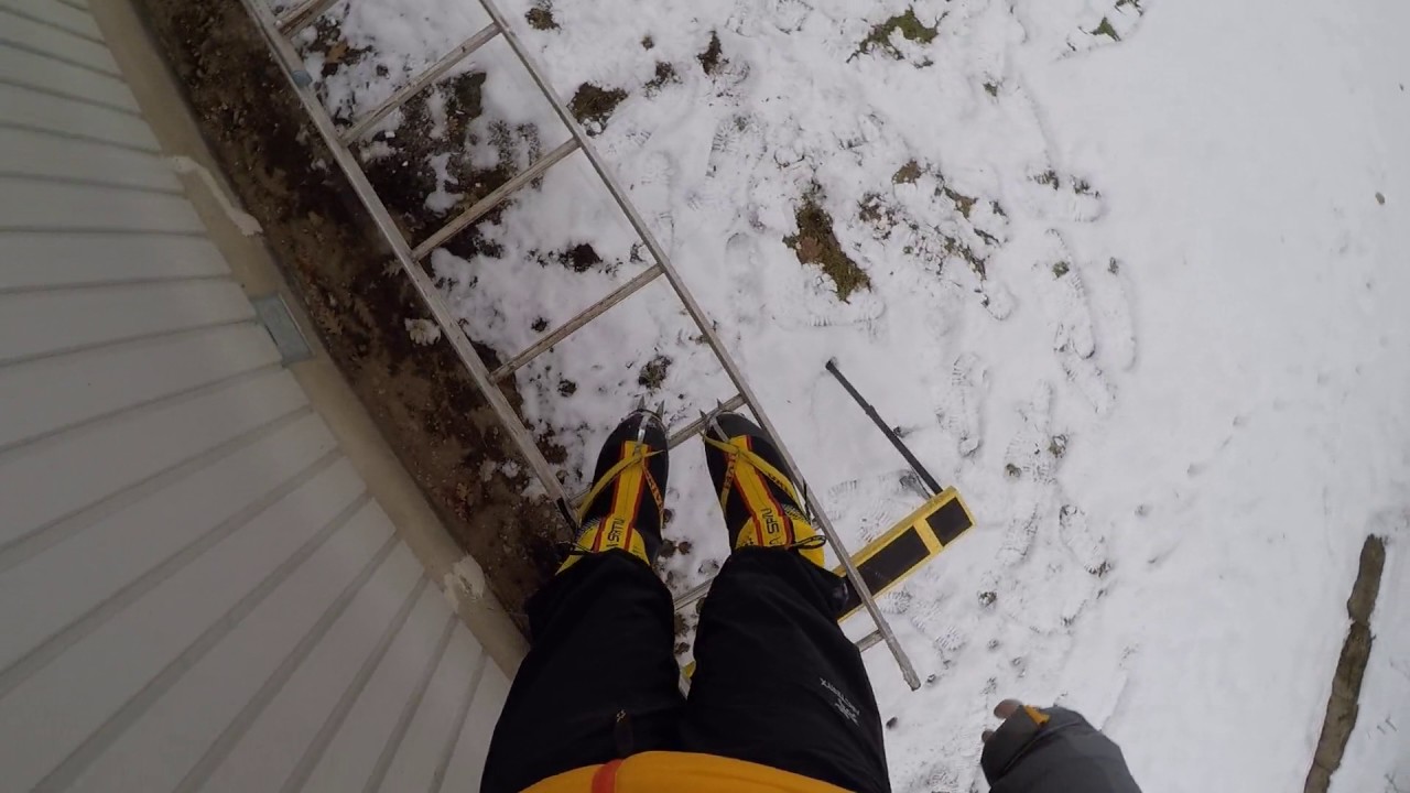 Icefall training - practising walking with crampons on ladders