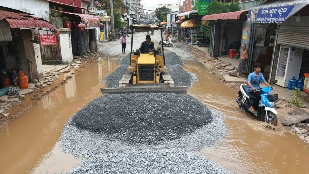 Repair old road in village pushing gravel by mini Komatsu d20p dozer & 12wheel dump truck transport 