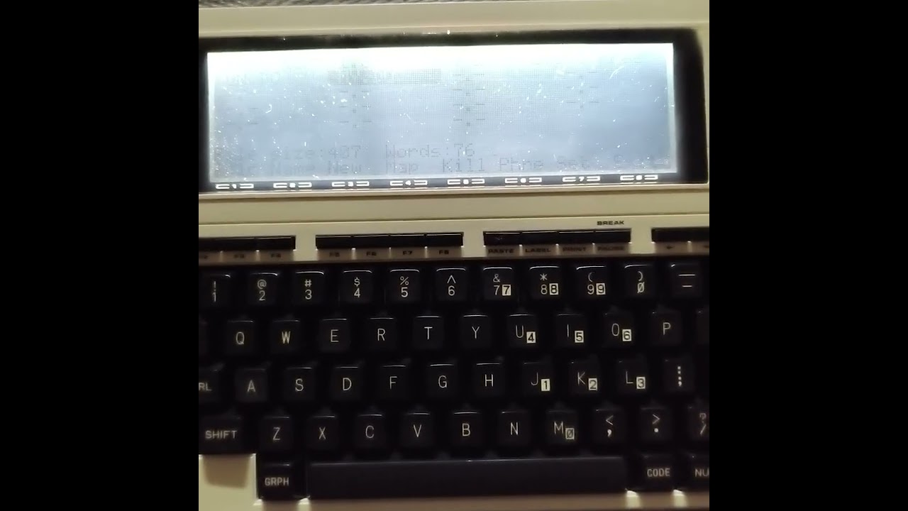 Tandy TRS 80 model 100 with front light mod