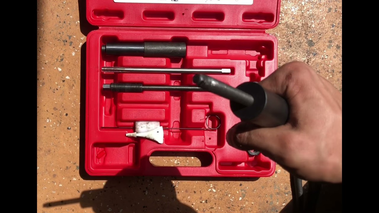 5.4L Triton: How to remove broken Spark Plugs using the OEM AUTOZONE kit.