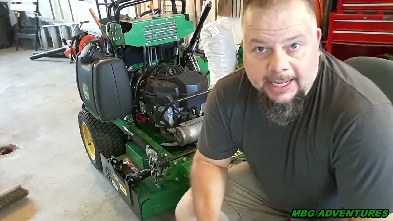 Changing and Sharpening Blades on a John Deere 636M Stand on Mower
