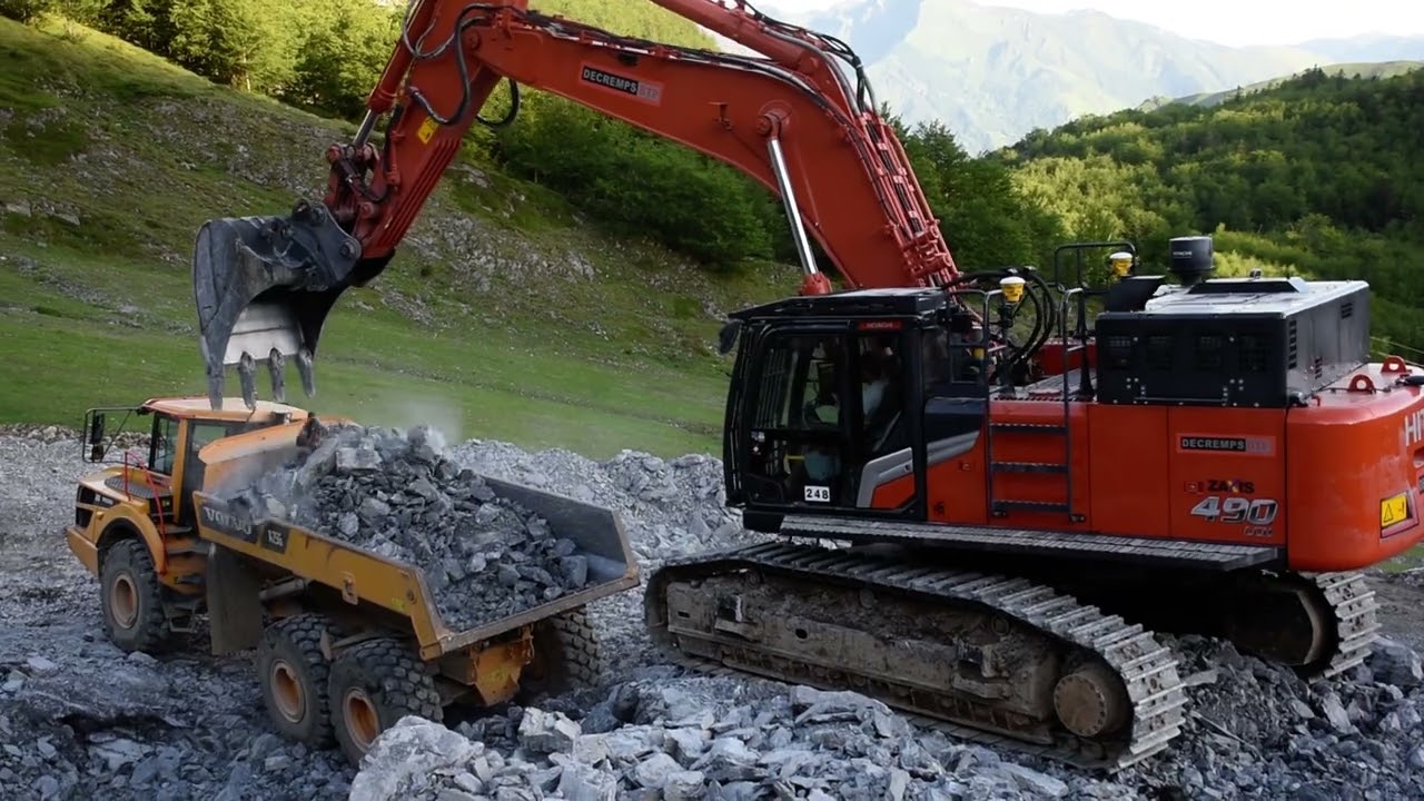 Hitachi ZX490 loading Volvo A25G - Part 2
