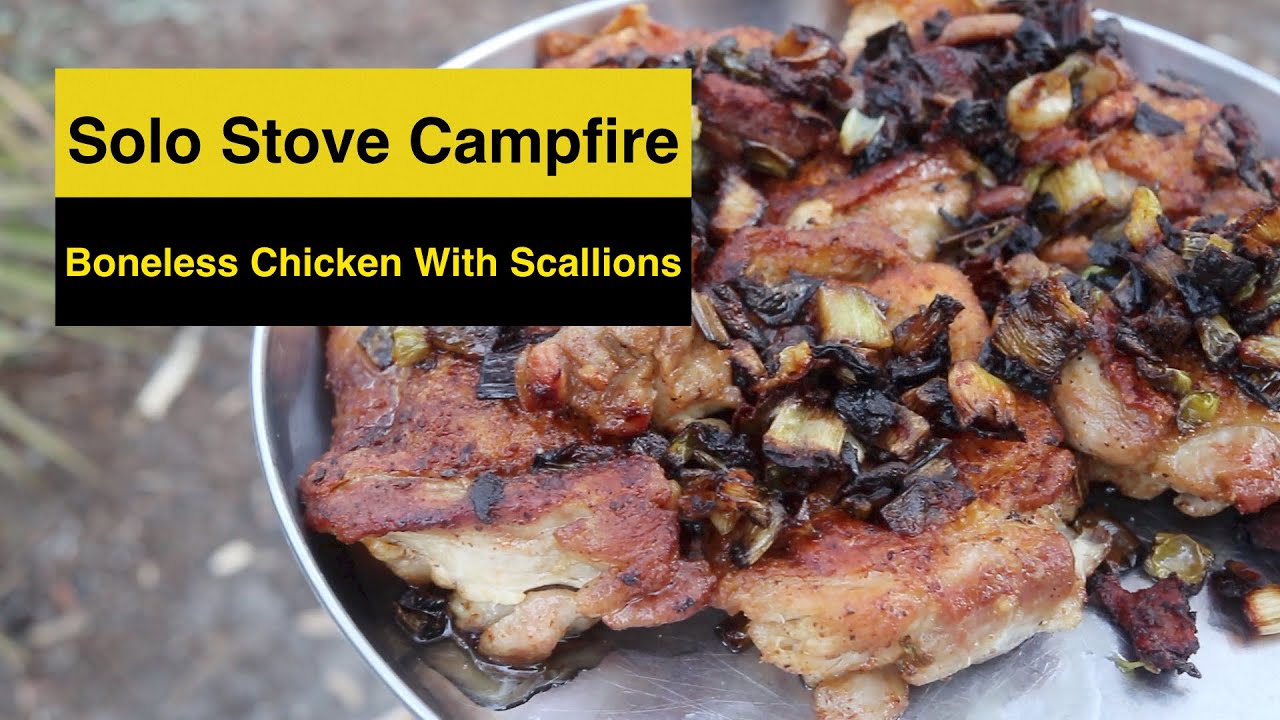 Cooking crispy skin Boneless chicken with scallion. Solo Stove campfire
