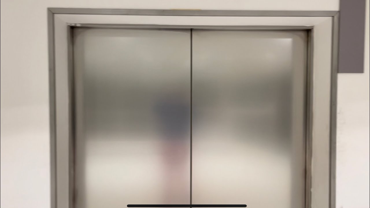 Kone Elevators at M&S going from the podium to store, West Quay Shopping Centre, Southampton