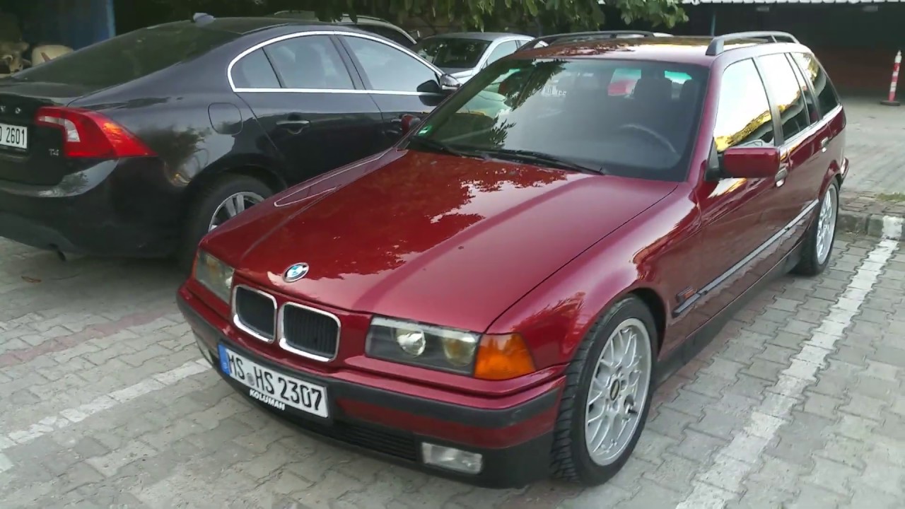 1995 e36 BMW 320i touring (252 Calypsorot Metallic)
