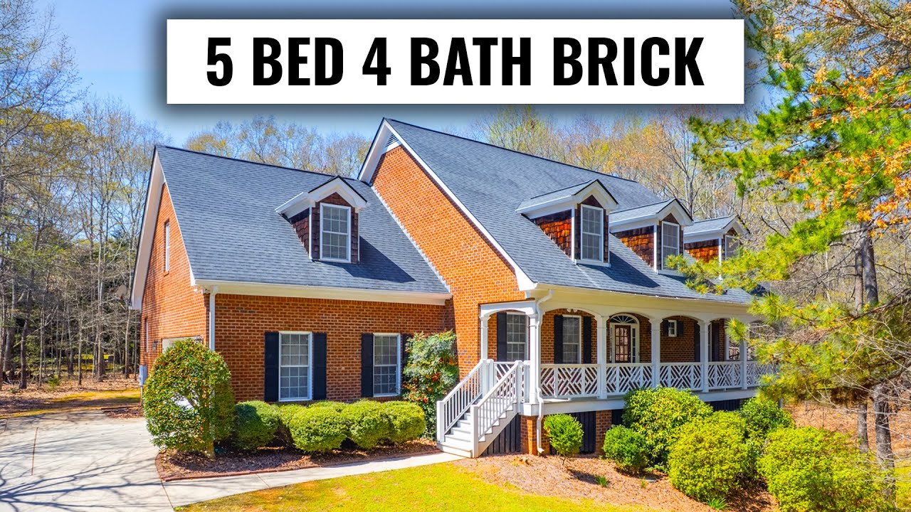 Stunning 4-Sided Brick Home in Statham, GA | With a Basement!