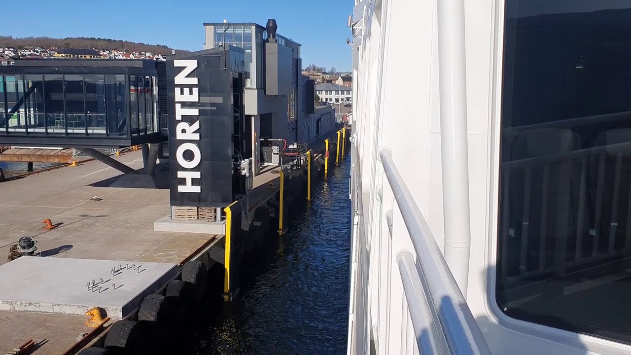 Worlds largest electric ferry connecting to a automatic robotic charger station