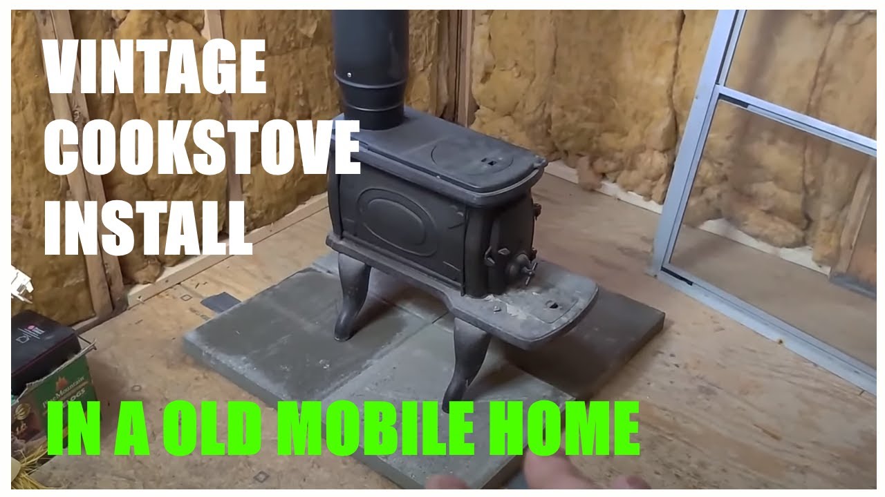 VINTAGE COOK STOVE INSTALLED - IMPROVISED UNDER PINNING - BIRD FEEDER - ICE AND SNOW STORM