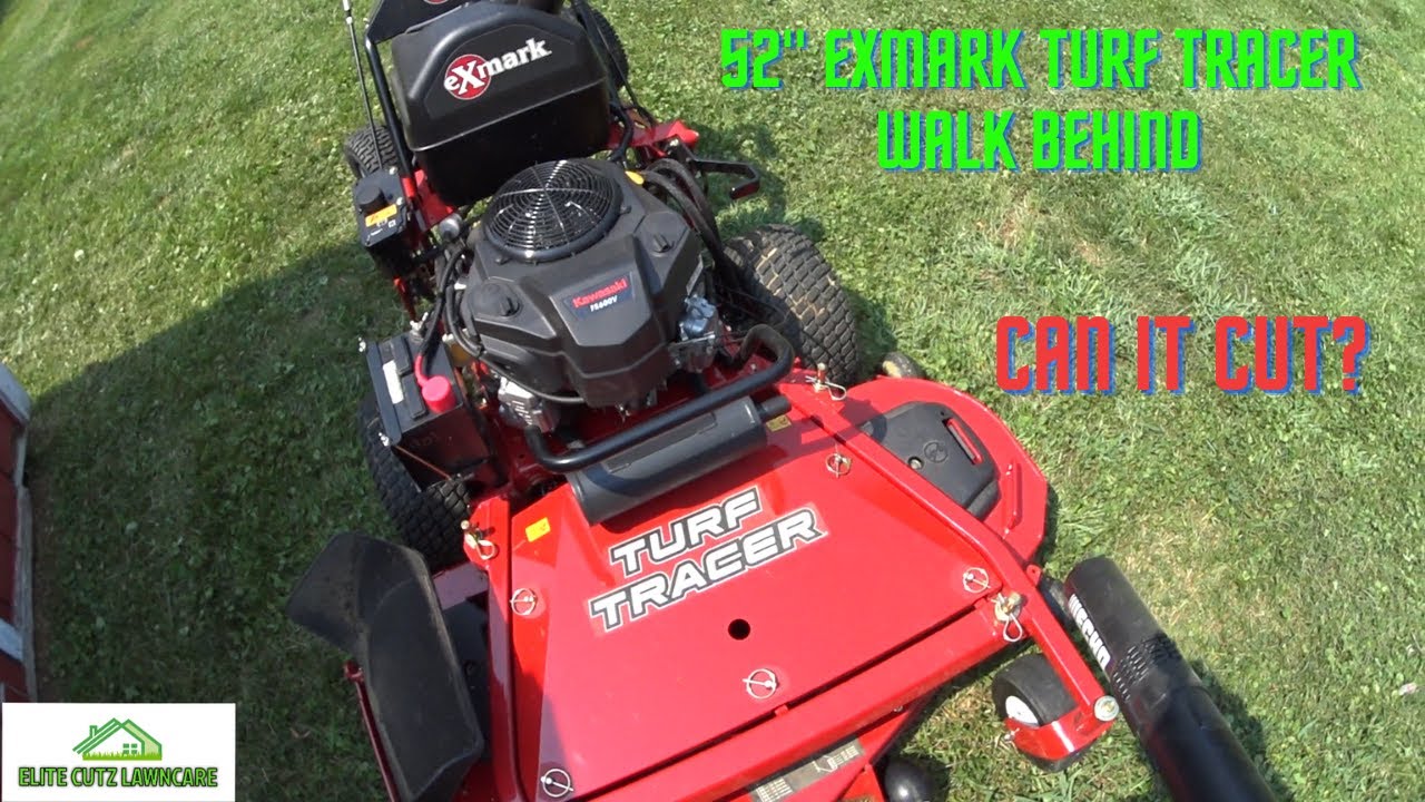 COMING OUT THE TRAILER WITH MY EXMARK TURF TRACER 52" WALK BEHIND, CAN IT CUT OR WHAT?