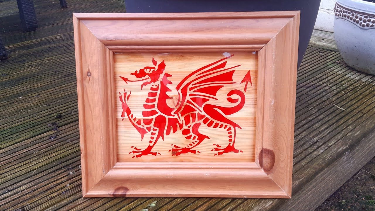 Welsh Dragon with resin inlay routed out on recycled pine, router project