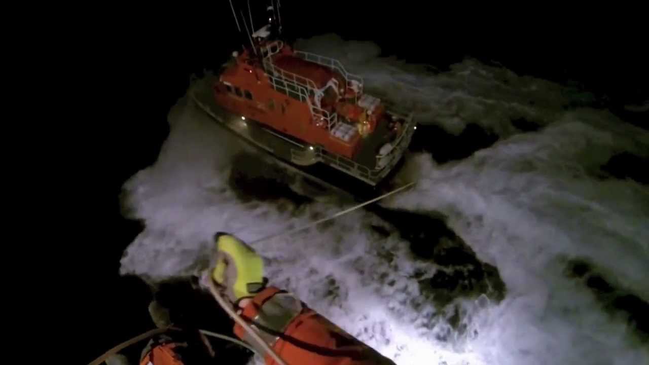 Stornoway SAR search rescue helicopter with Lifeboat conducting night operations