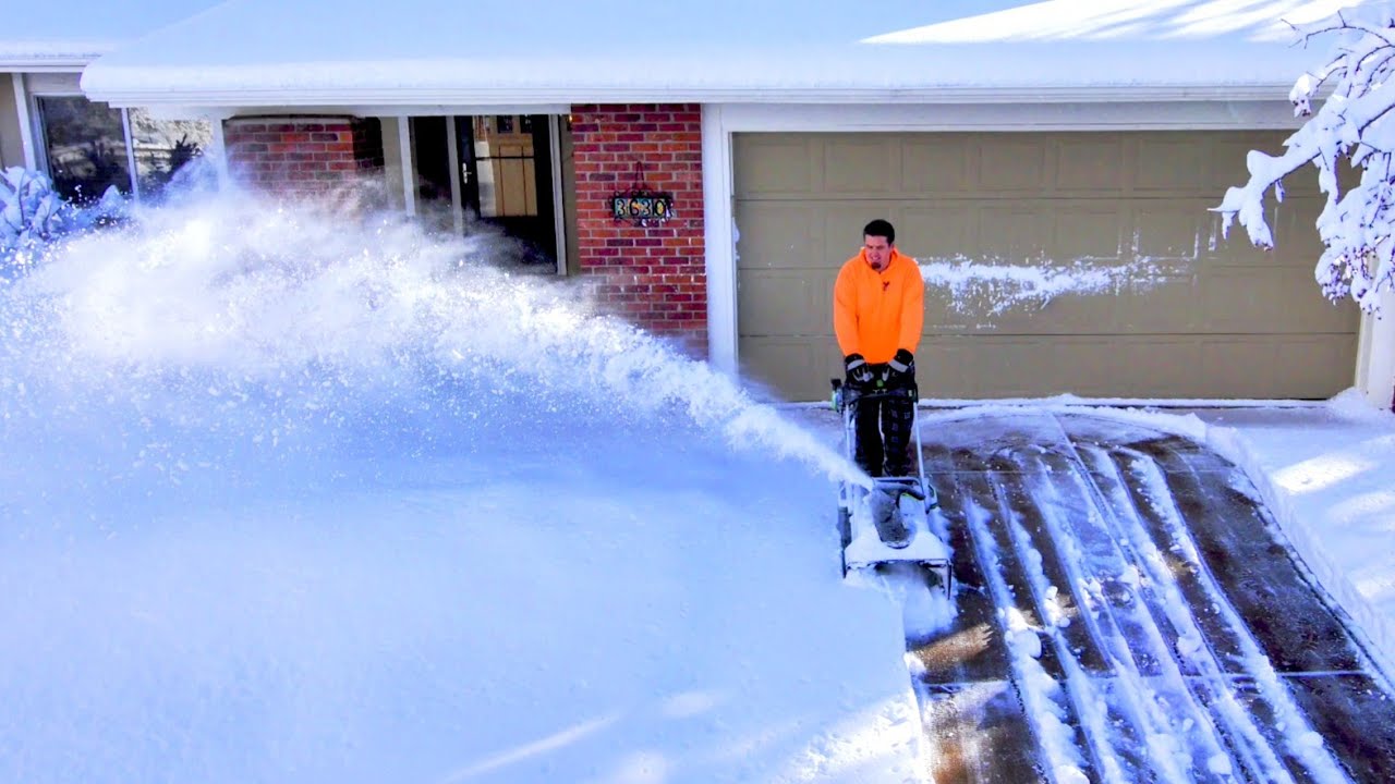 EGO BLASTING 1 FOOT OF WET HEAVY SNOW!