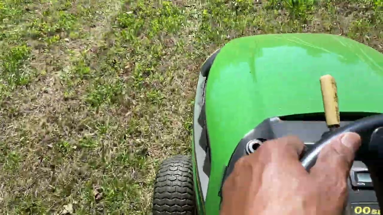 MOWING WITH A JOHN DEERE D-105 BEFORE THE DRIVEWAY IS INSTALLED.  @WEAREMOVINGOURHOME