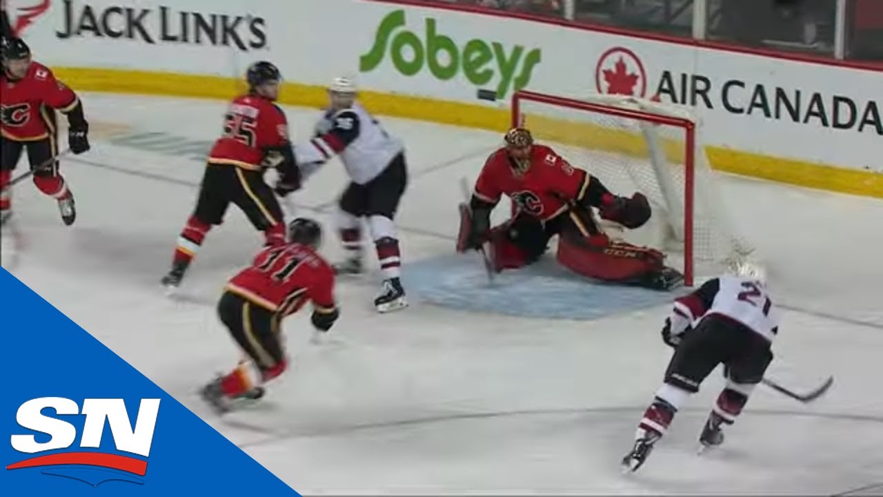 Mike Smith Slides Across to Make A Nice Save