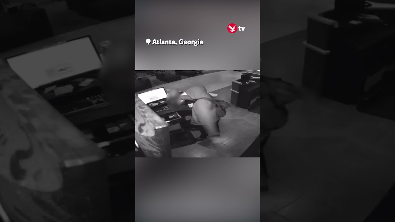 Armed robber steals $100 from hotel cash register #shorts